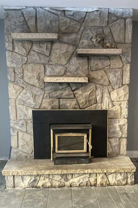 Stone fireplace insert installation