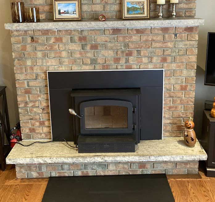 Brick fireplace insert installation
