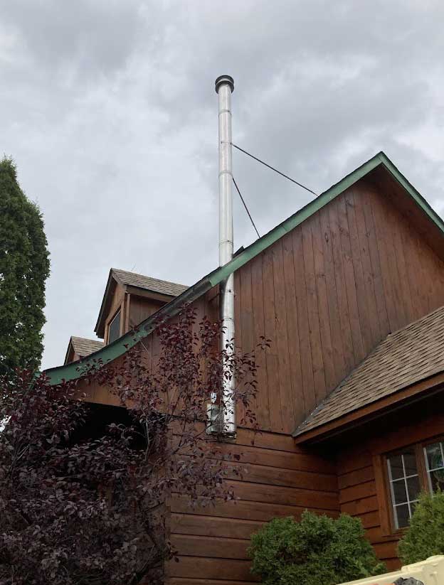 Custom wood building chimney installation