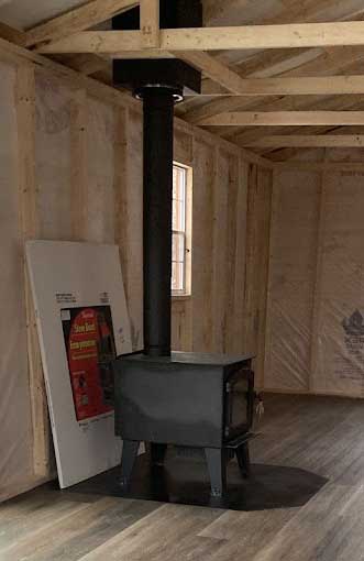 Interior wood stove installation